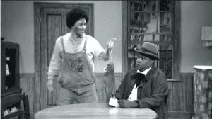 Two characters in a comedic scene.