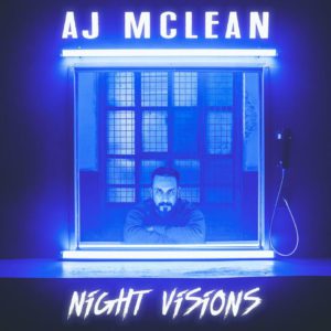AJ McLean under blue neon lights.