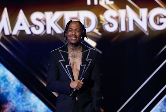 Masked Singer host Nick Cannon poses during a taping of the Season Nine Semifinals. (Photo property of FOX)