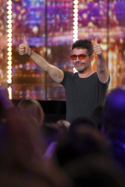 Simon Cowell gives AGT audience members two thumbs up during the Season 19 Judges Auditions. (Photo property of NBC's Trae Patton)