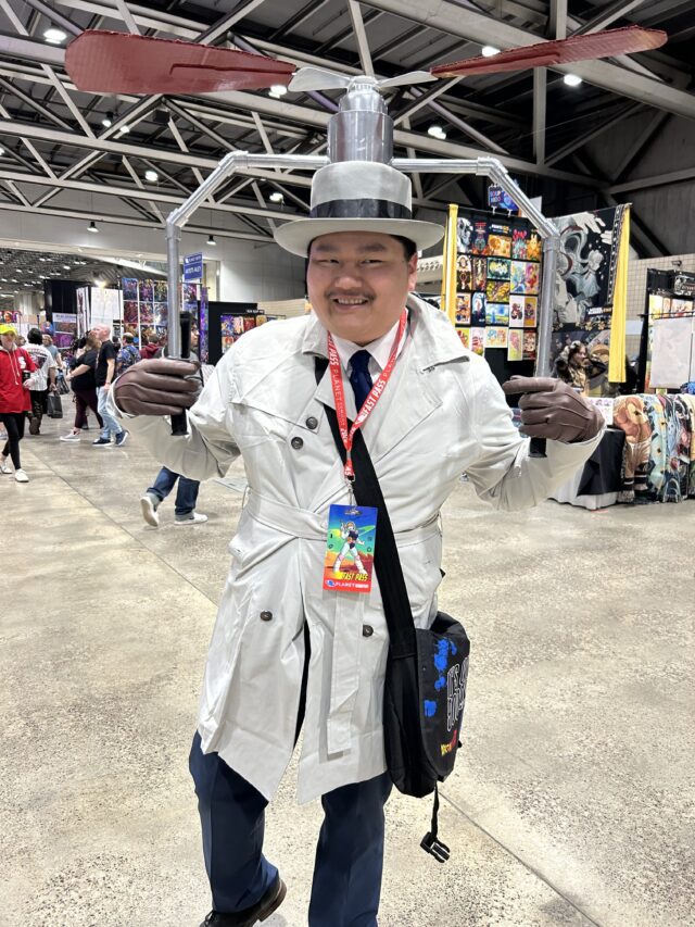 Planet Comicon Kansas City attendee showcases his Inspector Gadget cosplay.