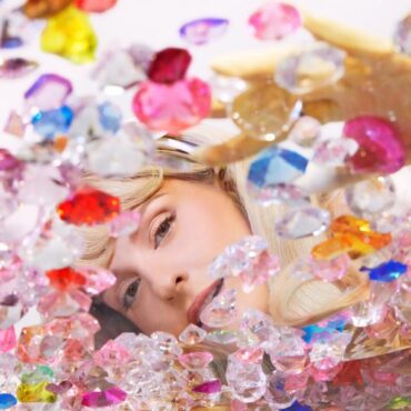 While there are some genuine pieces of ear candy on Meghan Trainor's Toy with Me, the album left me with an unsatisfied taste in my mouth. (Album cover property of Epic Records)
